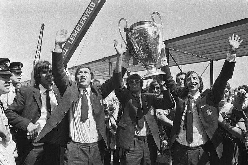 ajax team including cruff hold the europeanm cup aloft in 1971